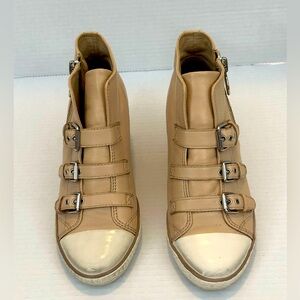 Wedge heel sneaker shoe boot style. Sz 40 Tan color. Worn several times.